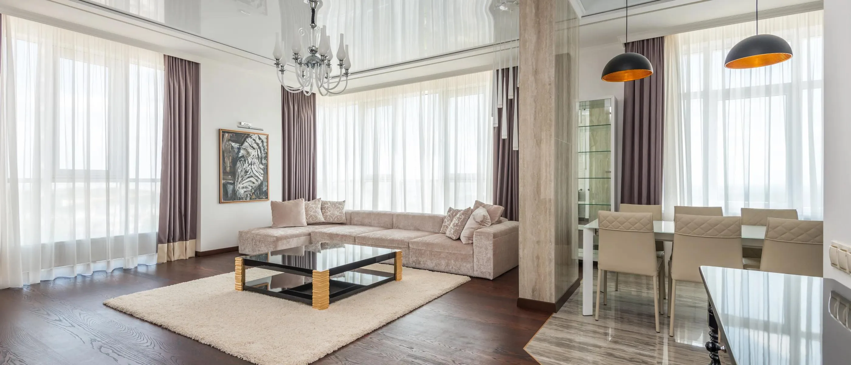 Bright contemporary living room featured as an example of luxury real estate editorial photography